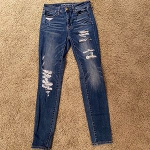 Medium Wash American Eagle High-Waisted Distressed Skinny Jegging- Size 4